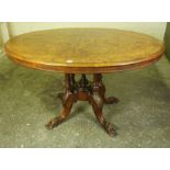 Victorian Inlaid Walnut Loo Table, Having a snap action tilt top, raised on columns and