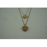 Two 9ct Gold Heart Shaped Lockets, on 9ct Gold Chains, stamped 375 to catch, 28cm long, overall