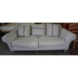 Chesterfield Upholstered Sofa, Would comfortably sit three people, with cushions, raised on turned