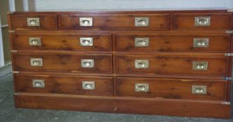 Ships Style Chest of Drawers, Having ten assorted drawers, Decorated with brass handles, 71cm