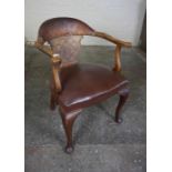 Stained Wood Bow Back Armchair, circa late 19th / early 20th century, Having a carved floral motif