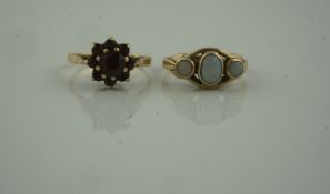 9ct Gold Opal Three Stone Ring, set with three graduated opals, stamped 375, also with a 9ct gold