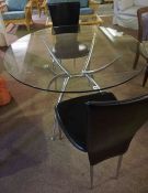 Contemporary Glass Circular Table, raised on chrome style supports, 75cm high, 109cm diameter,