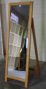 Modern Light Oak Cheval Mirror, raised on an easel support, 159cm high, 53cm deep