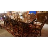 Reproduction Extending Dining Table with a set of Eight Mahogany Dining Chairs by Universal, the