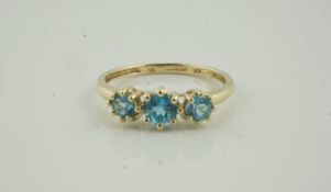 9ct Gold Gem Set Three Stone Ring, set with three aquamarine coloured stones, stamped 375, overall