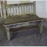 Stained Oak Garden Bench by Iain McGregor Designs of Berwick, Having retailers plaque to side,