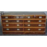 Ships Style Chest of Drawers, Having nine assorted drawers, Decorated with brass handles, 71cm high,