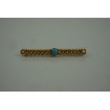 9ct Gold Turquoise Brooch, set with a turquoise stone to the centre, stamped 375, 6.5cm long,