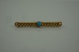 9ct Gold Turquoise Brooch, set with a turquoise stone to the centre, stamped 375, 6.5cm long,