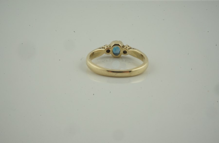 9ct Gold Gem Set and Diamond Ring, Having a single gem stone, flanked with diamond chips to the - Image 4 of 5