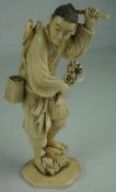 Japanese Ivory Figure of a Fisherman, Meiji period, pre 1947, character marks to underside, 18cm