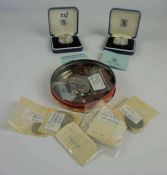 Two United Kingdon Silver Commemorative Two Pounds Coins, by the Royal Mint, in capsules and