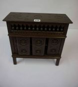 Apprentice Burmese Style Dresser, Having sliding doors enclosing a shelved interior, 36cm high, 35cm