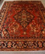 Persian Carpet, Decorated with allover floral medallions on a red ground, 330cm x 262cm