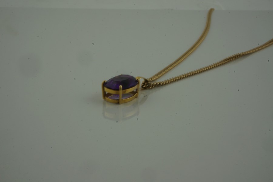 Amethyst Pendant, set in an unmarked yellow metal mount, on a 9ct gold chain, stamped 375 to - Image 3 of 6