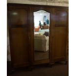 Mahogany Wardrobe, Having a central mirrored section, flanked with a door, raised on cabriole