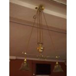 Brass Rise and Fall Ceiling Light, circa early 20th century, Having a pully mechanism, with two