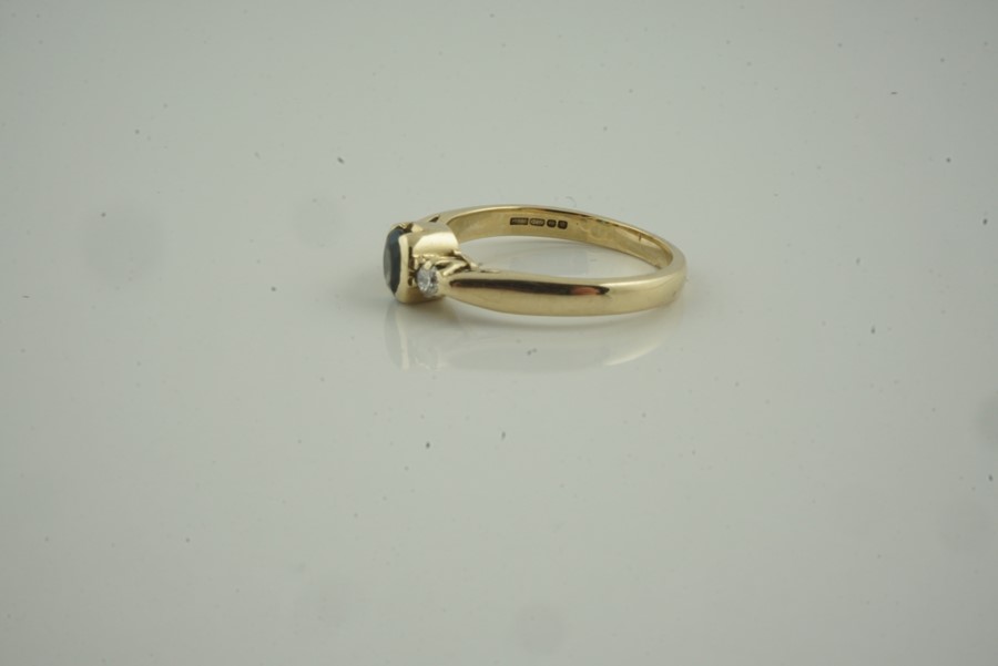 9ct Gold Gem Set and Diamond Ring, Having a single gem stone, flanked with diamond chips to the - Image 2 of 5