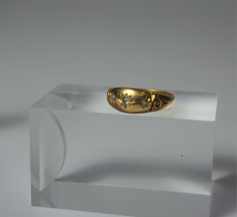 18ct Gold Diamond Ring, Set with three small diamond stones, Hallmarks for Birmingham, year date