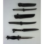 Two Japanese Daggers, Blades 16cm long, stamped Japan, having metal handles, with black leather