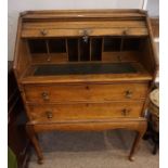 Oak Writing Bureau, circa early 20th century, Having a tambour roller shutter enclosing fitted