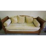 French Style Hall Sleigh Settee, Upholstered in lemon fabric, with cushions and rolled cushions,