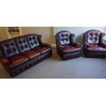 Chesterfield Ox Blood Leather Three Piece Suite, Comprising of three seater sofa with a pair of