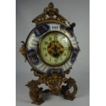 French Porcelain Moon Shaped Mantel Clock by Brevette, circa late 19th / early 20th century,