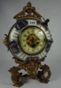 French Porcelain Moon Shaped Mantel Clock by Brevette, circa late 19th / early 20th century,