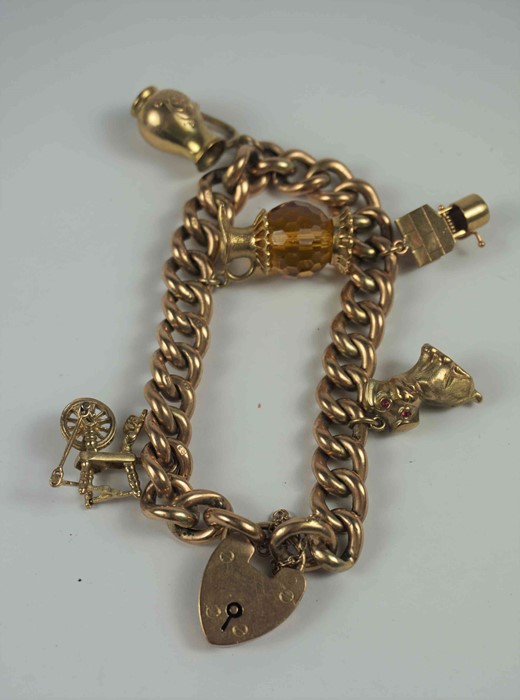 9ct Gold Padlock Bracelet, With five assorted attached charms, stamped 9ct to padlock and links, - Image 4 of 4