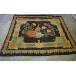 Old Turkish Kilim Rug, Decorated with peacocks in foliage on a black ground, 190cm x 160cm