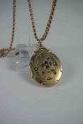 Late Victorian Ruby and Seed Pearl Locket, Possibly unmarked gold, Monogrammed to reverse, 3cm, on a