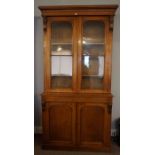 Victorian Oak Two Door Library Bookcase, Having two glazed doors to the top section, enclosing a