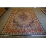 Louri Carpet, Decorated with allover floral motifs on a red and cream ground, 300cm x 210cm