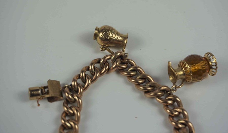 9ct Gold Padlock Bracelet, With five assorted attached charms, stamped 9ct to padlock and links, - Image 3 of 4