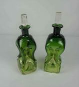 Pair of Green Glass Decanters with Stoppers, circa late 19th / early 20th century, 28cm high, (2)