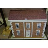Large Dolls House, Enclosing six rooms, with a quantity of dolls furniture