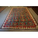 Mood Carpet, Decorated with panels of trees and geometric motifs on blue ground, with red and