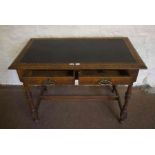Oak Writing Table, circa late 19th / early 20th century, Having two drawers, raised on turned