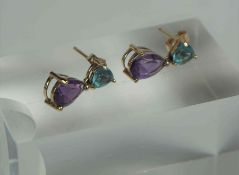 A Pair of Gem Set Earrings, The stones set in Amethyst and Aquamarine colours, on a yellow metal