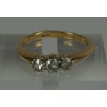 18ct Gold Diamond Three Stone Ring, Stamped 18ct, gross weight 3.3 grams