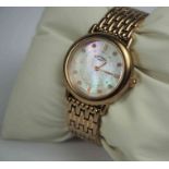 Rotary Gold Coloured Stainless Steel Ladies Wristwatch, Having a faux mother of pearl dial, with