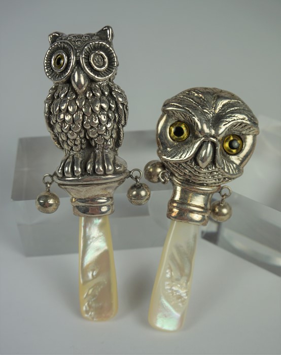 Two Silver Baby Rattles, Modelled as owls, stamped Sterling to one, with faux mother of pearl