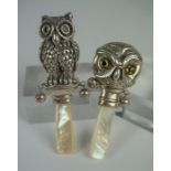 Two Silver Baby Rattles, Modelled as owls, stamped Sterling to one, with faux mother of pearl