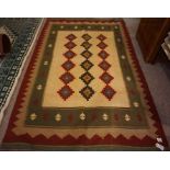 Persian Kilim Rug, Decorated with six rows of three geometric motifs on a cream, orange and red