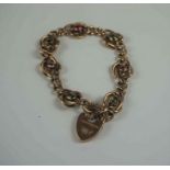 9ct Gold Gem Set Padlock Bracelet, Set with three peridot and pink stones (possibly topaz),