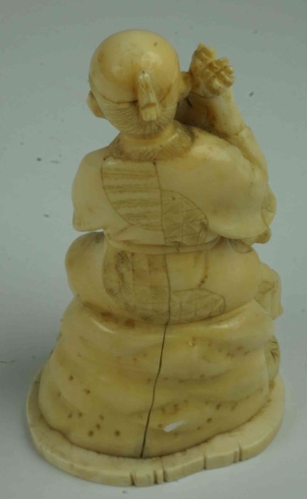 Japanese Ivory Figure Group, Meiji period, pre 1947, Modelled as a buddha with child, raised on a - Image 4 of 7