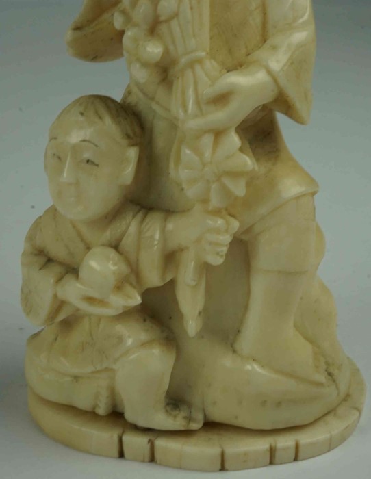 Japanese Ivory Figure Group, Meiji period, pre 1947, Modelled as a buddha with child, raised on a - Image 3 of 7
