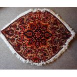 Bakhtiar Rug, Decorated with allover floral medallions on a beige ground, 143cm x 108cm